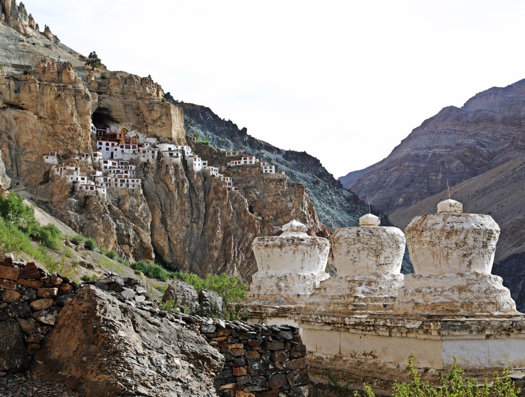 Chortens in front of Phuktal Gompa