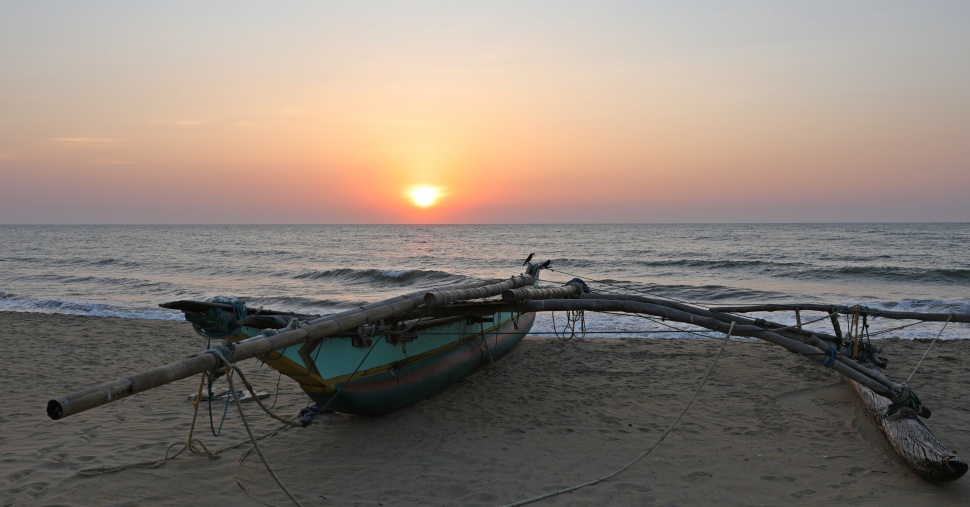 Sunset behind a fishing boat, Negombo Beach