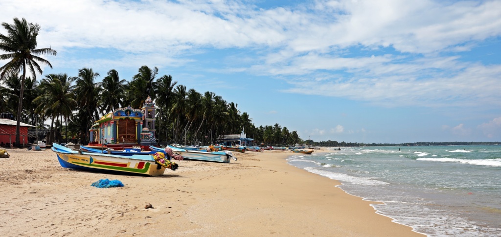 Hindu temples and fishing boats, Uppuveli Beach
