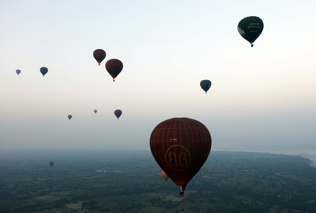 Hot air balloons over ancient temples in Bagan